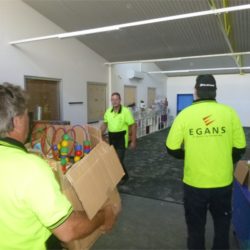 Egans staff moving boxes