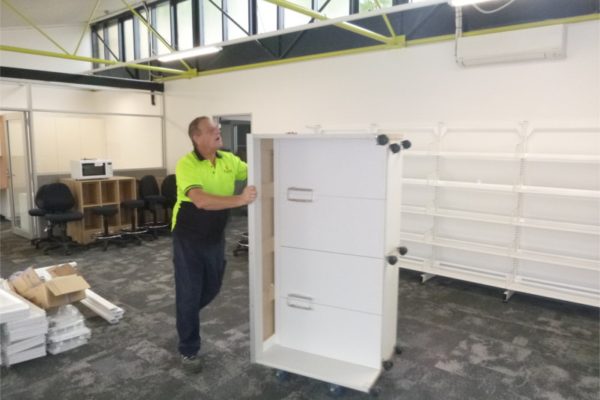 moving a white cupboard