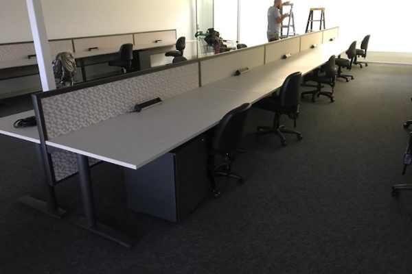 straight row of office workstations
