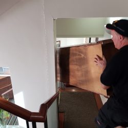 Moving furniture down the stairs